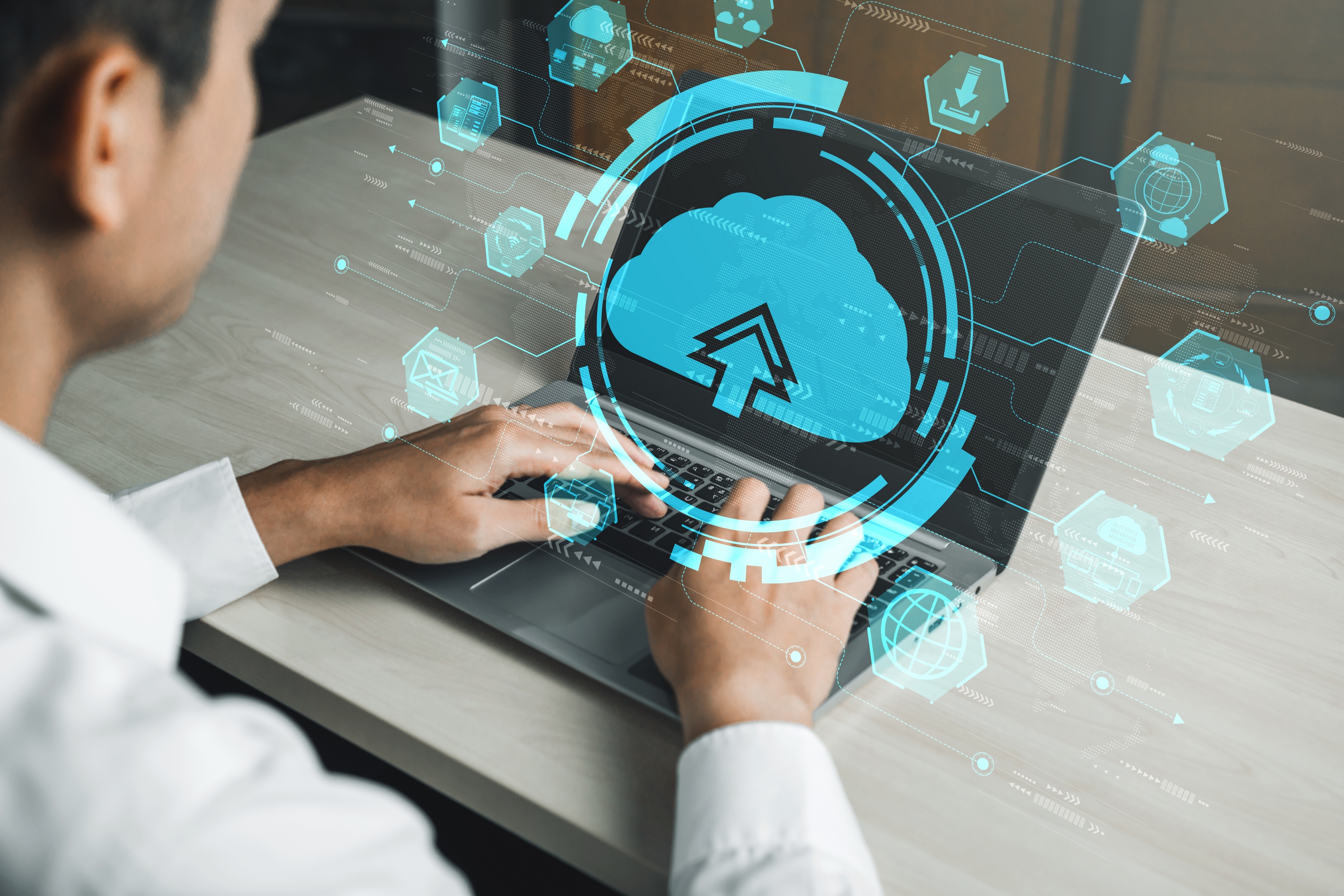 Cloud computing technology and online data storage for business network concept. Computer connects to internet server service for cloud data transfer presented in 3D futuristic graphic interface.